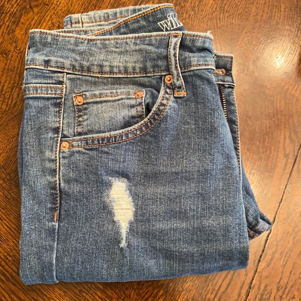 Light wash lightly ripped jeans